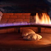 Picture - Baked Bread in Brick Oven